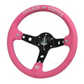 Pink leather steering wheel cover with embroidery, showing aluminium bracket
