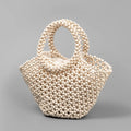 Hand-woven maple wood hollow handbag with wooden bead decoration in dumpling shape