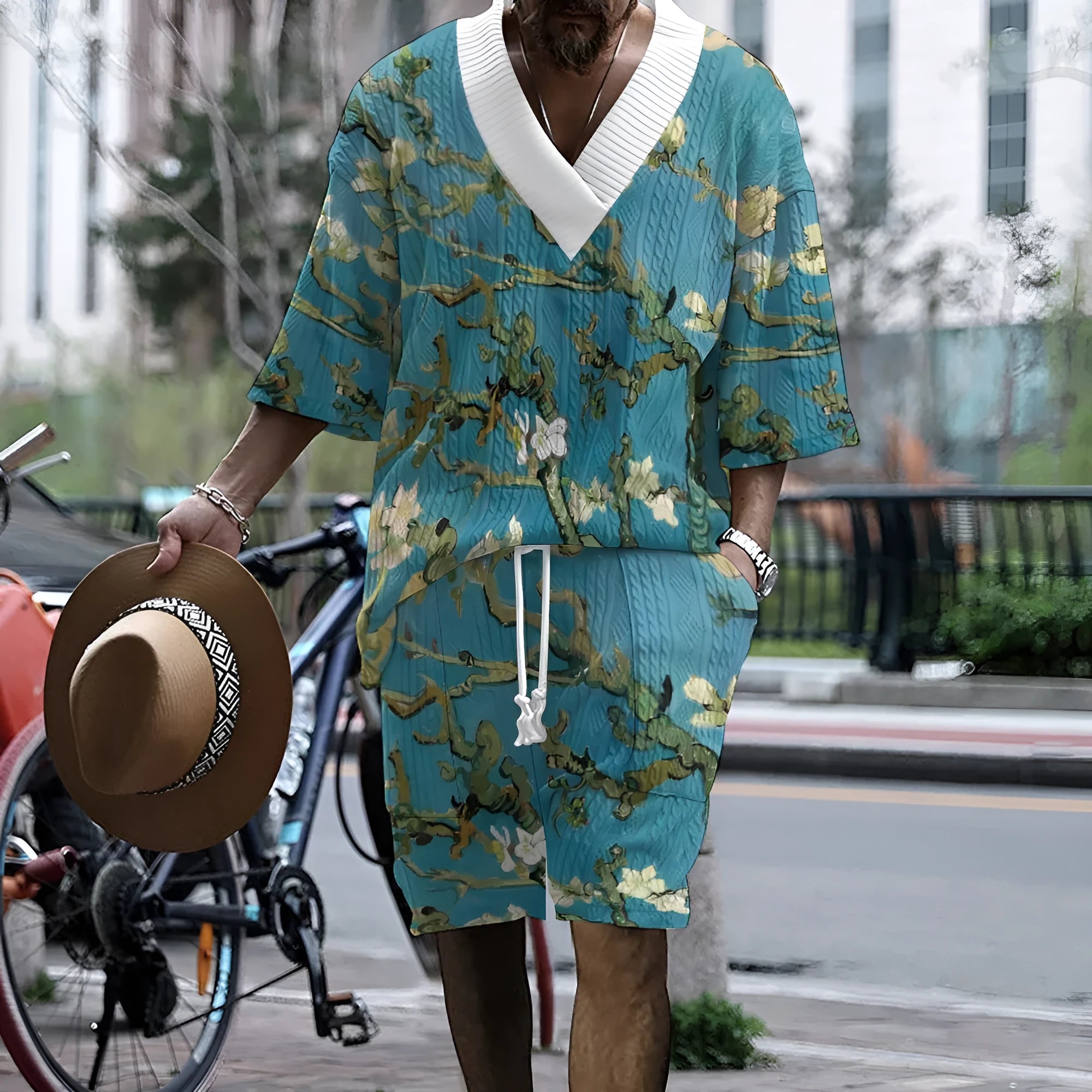Men's peacock blue 3D printed casual suit with knitted shorts and T-shirt.