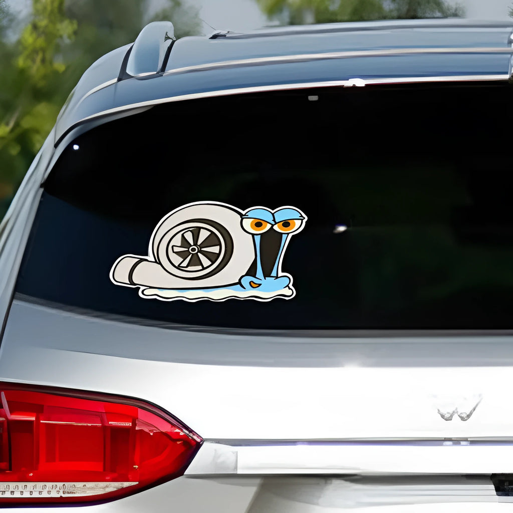 Reflective cartoon snail design car sticker measuring 12 by 8 centimetres.