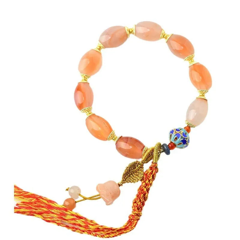 Handcrafted agate Tibetan bracelet with flower and geometric designs in vintage ethnic style