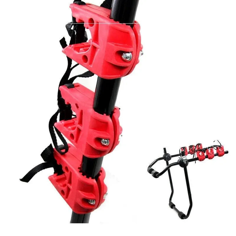 Black and red iron frame bike rack with straps for car boot mounting.