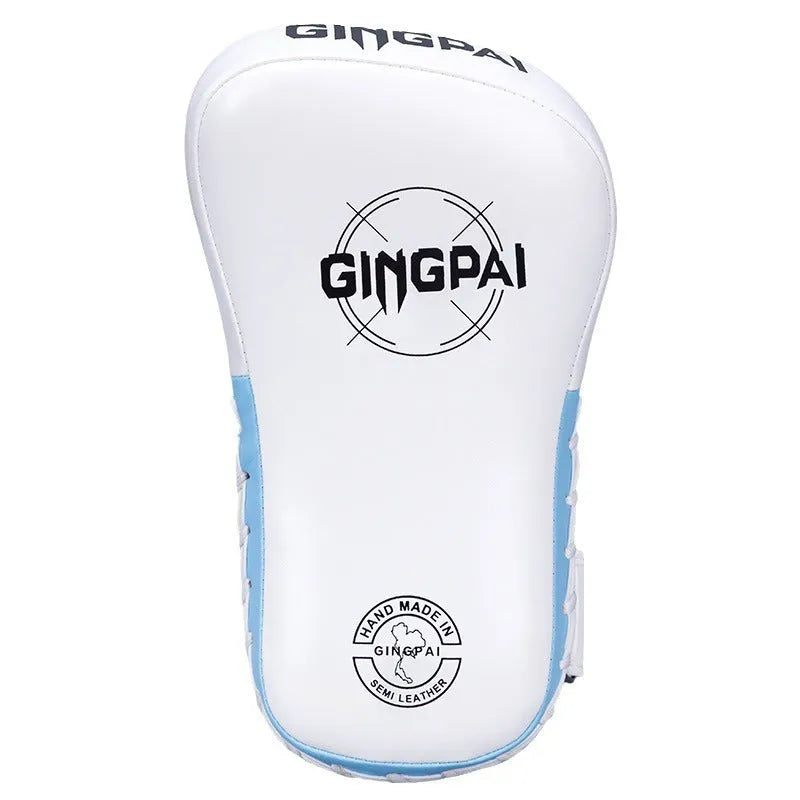A pair of children's hanging boxing leg target pads in red PU foam for martial arts training.