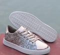 Women's black, pink and gold sequin casual low-top lace-up shoes with round toe and rubber sole.