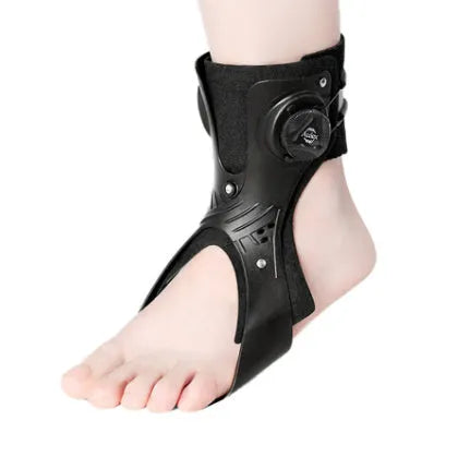 Grey ankle support brace with airbag button compression system showing adjustable fastening