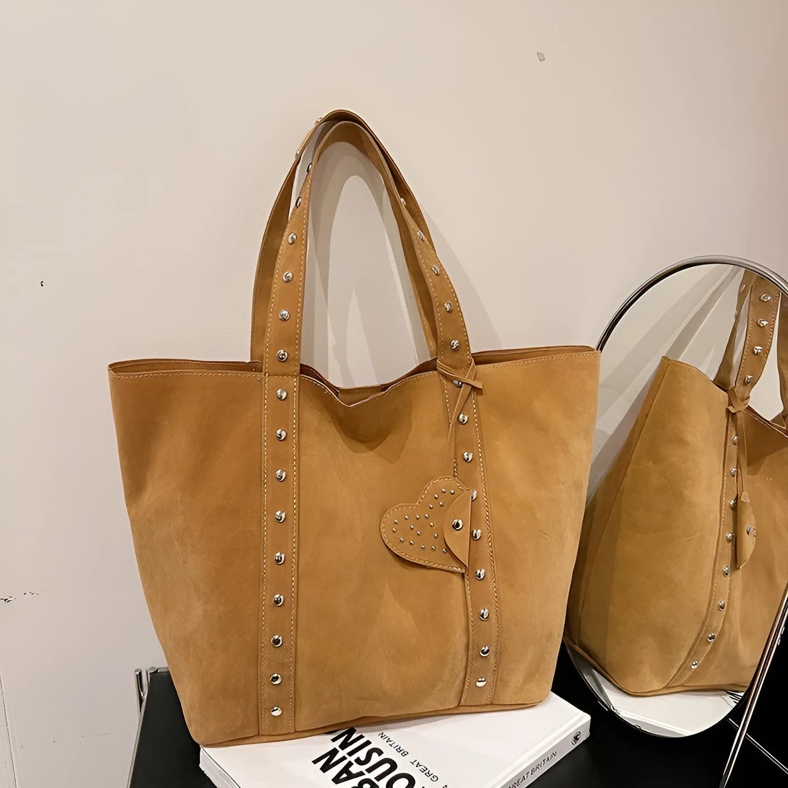 Black PU leather tote bag with double shoulder straps showing sandwich pocket and horizontal square shape