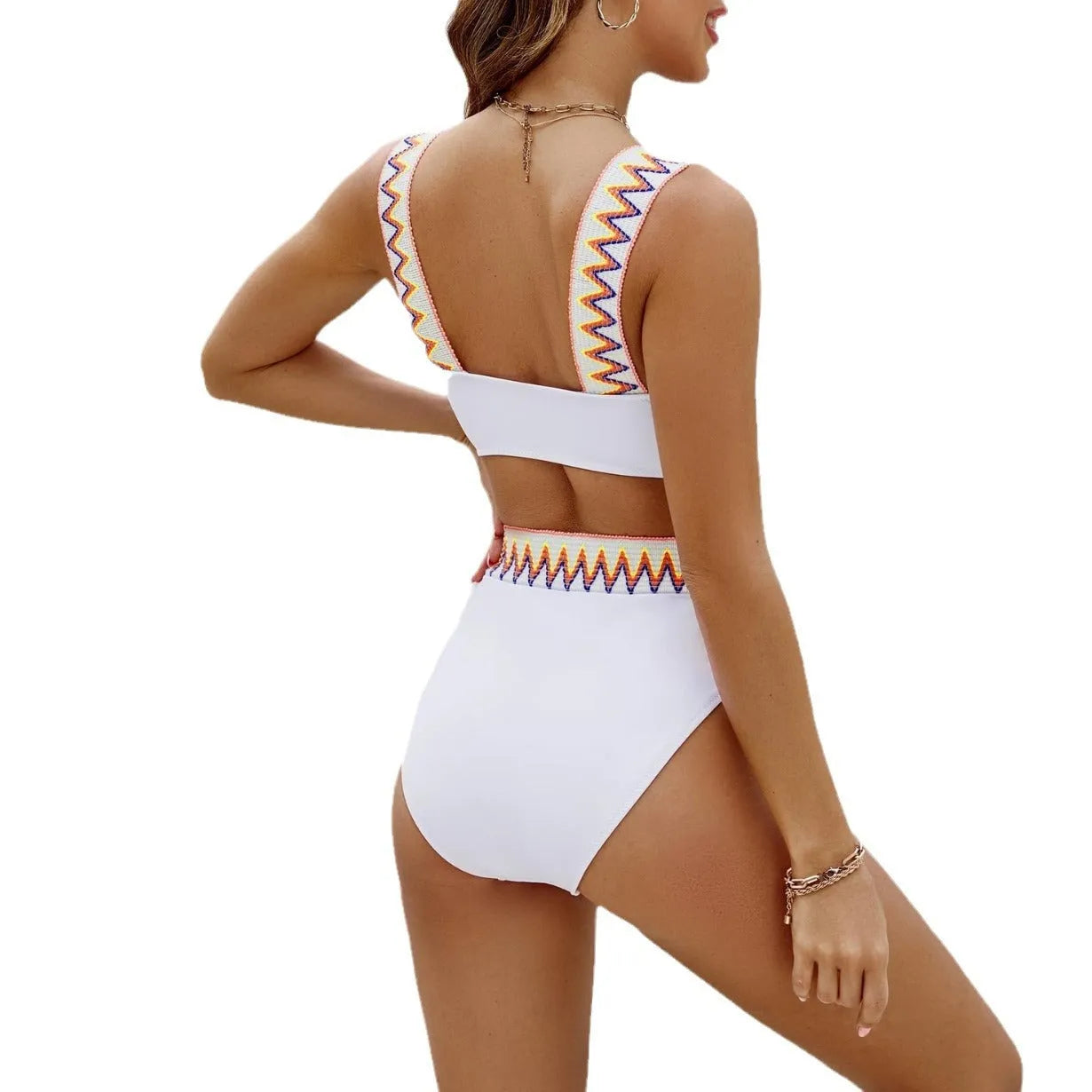 Black and white women's lace-up bikini with high-waisted briefs and backless swimsuit design