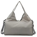 Women's large capacity Oxford cloth yoga bag with dry and wet separation in grey, shown with a yoga mat and laptop inside