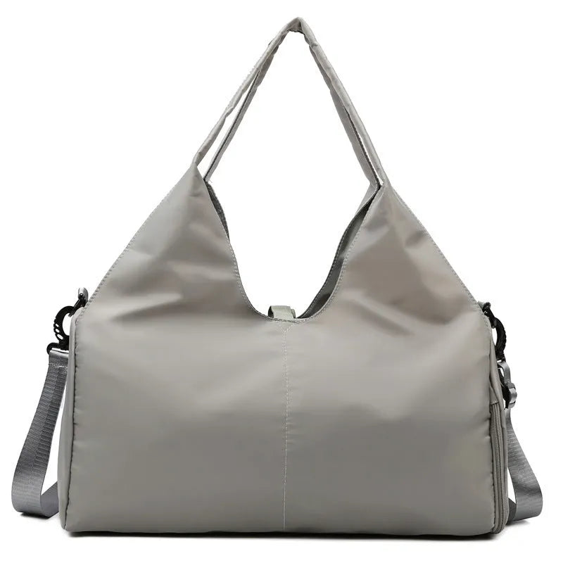 Women's large capacity Oxford cloth yoga bag with dry and wet separation in grey, shown with a yoga mat and laptop inside