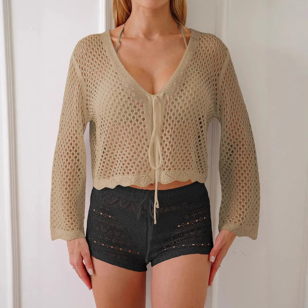 Short apricot women's cardigan blouse with bell sleeves and hollow woven texture.