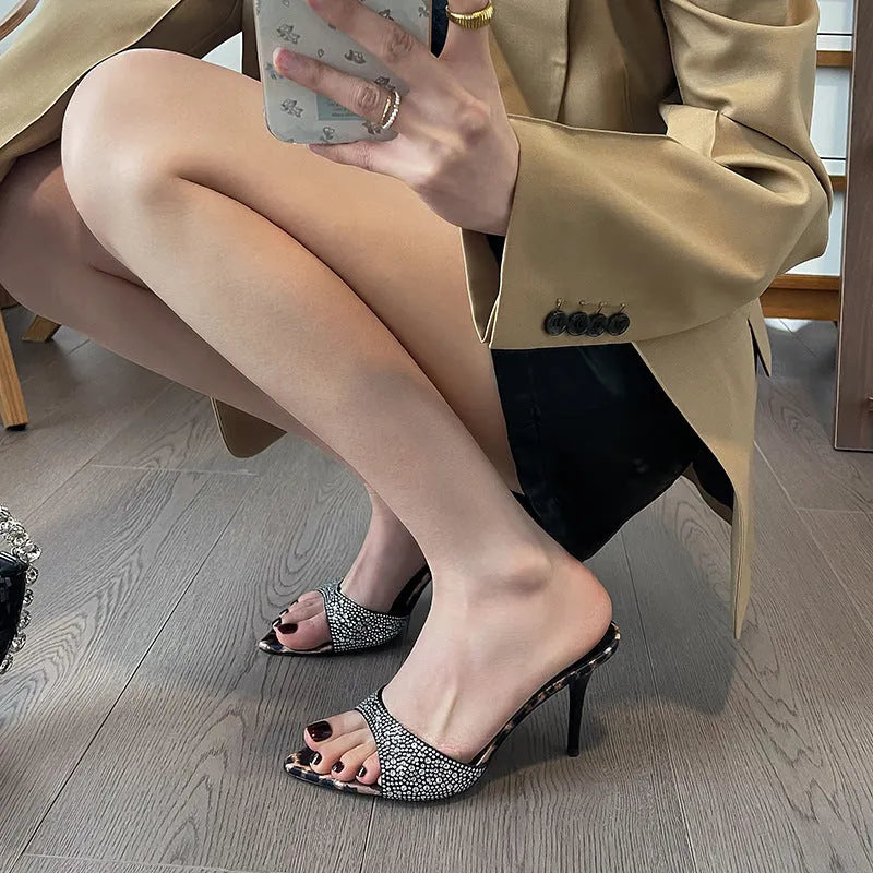 Black women's pointed toe stiletto sandals with 8cm heels and rhinestone detailing on microfiber upper