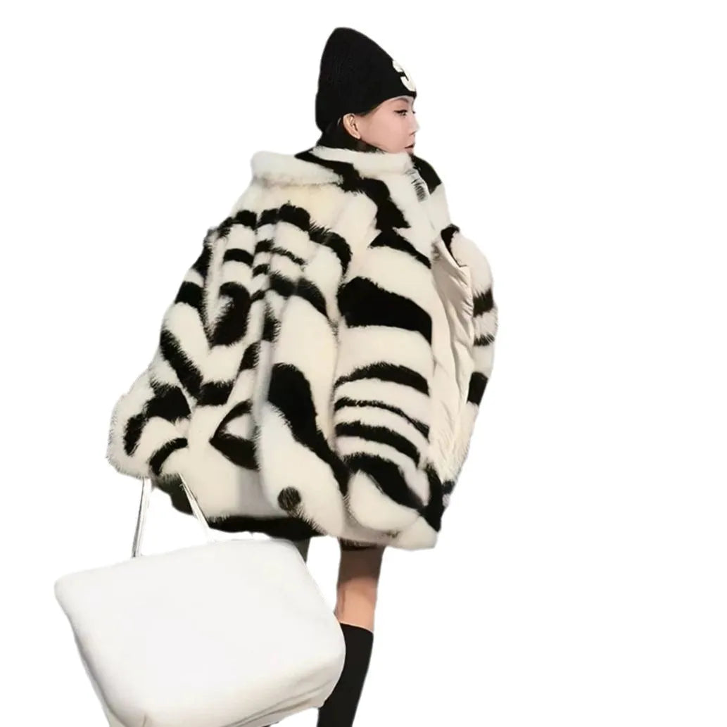 Women's zebra stripe polyester fur top with large skimmer collar and long sleeves