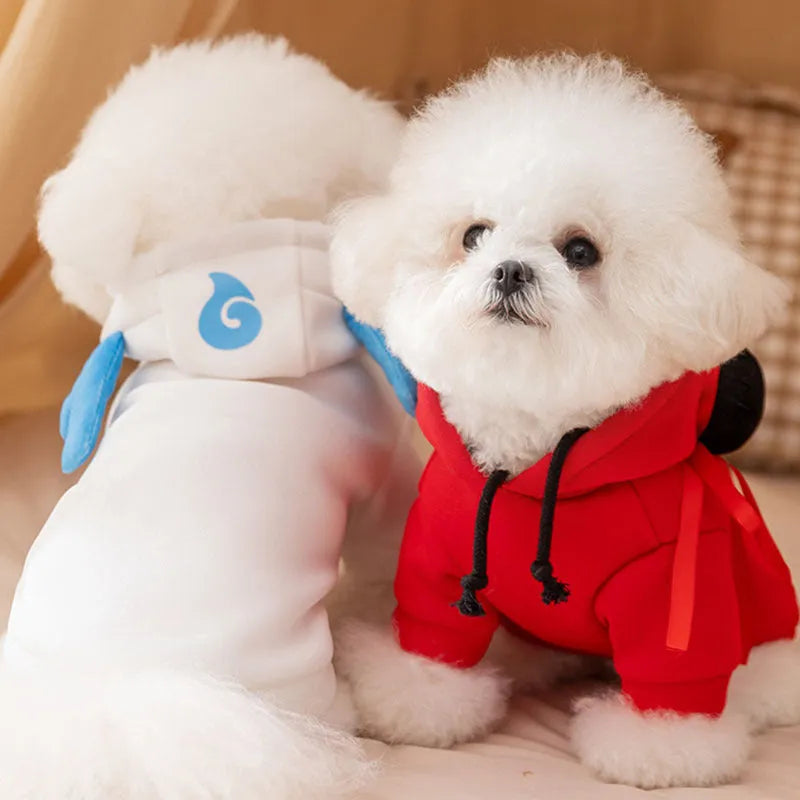 Red Nezha style pet hoodie with black meatball decorations and yellow badge on a small dog