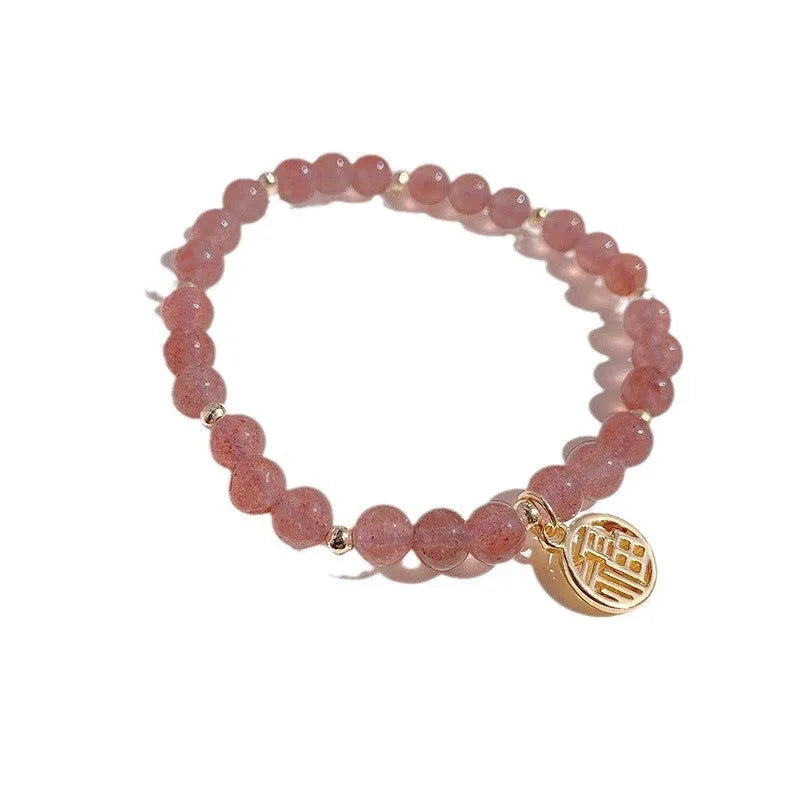 Handmade strawberry quartz blessing card bracelet with glass construction and adjustable universal wrist size