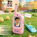 Two mini video walkie talkies for kids in pink and blue with 2.0 inch screen and charging cable