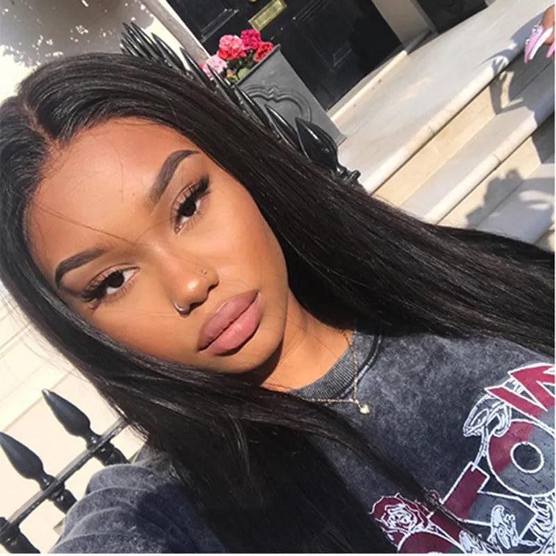 A long straight black synthetic wig with centre-parted bangs, made from high-temperature fibre.