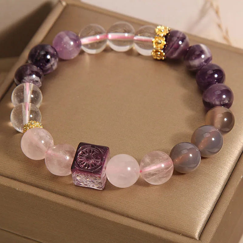 Purple natural amethyst crystal women's bracelet with rhinestone details, 10mm size.
