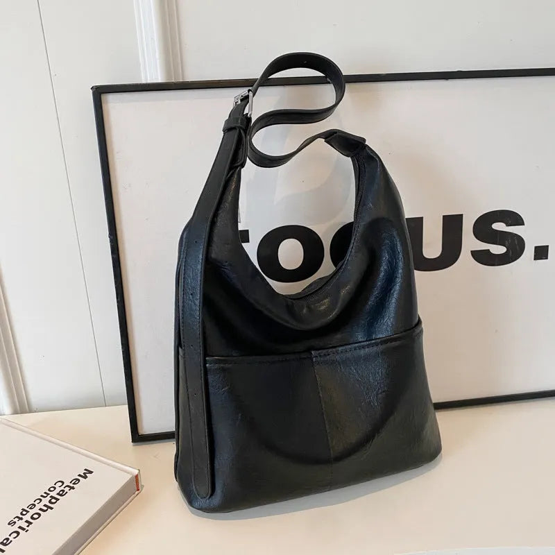 Women's large-capacity soft PVC shoulder bag bucket shape with stitching in beige white colour