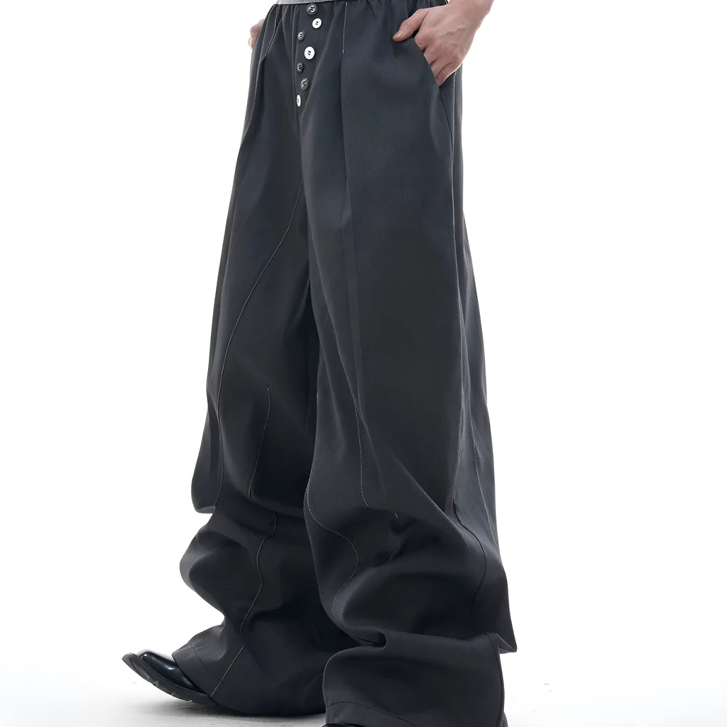 Drooping straight-leg casual pants in black with high waist and button open line design.