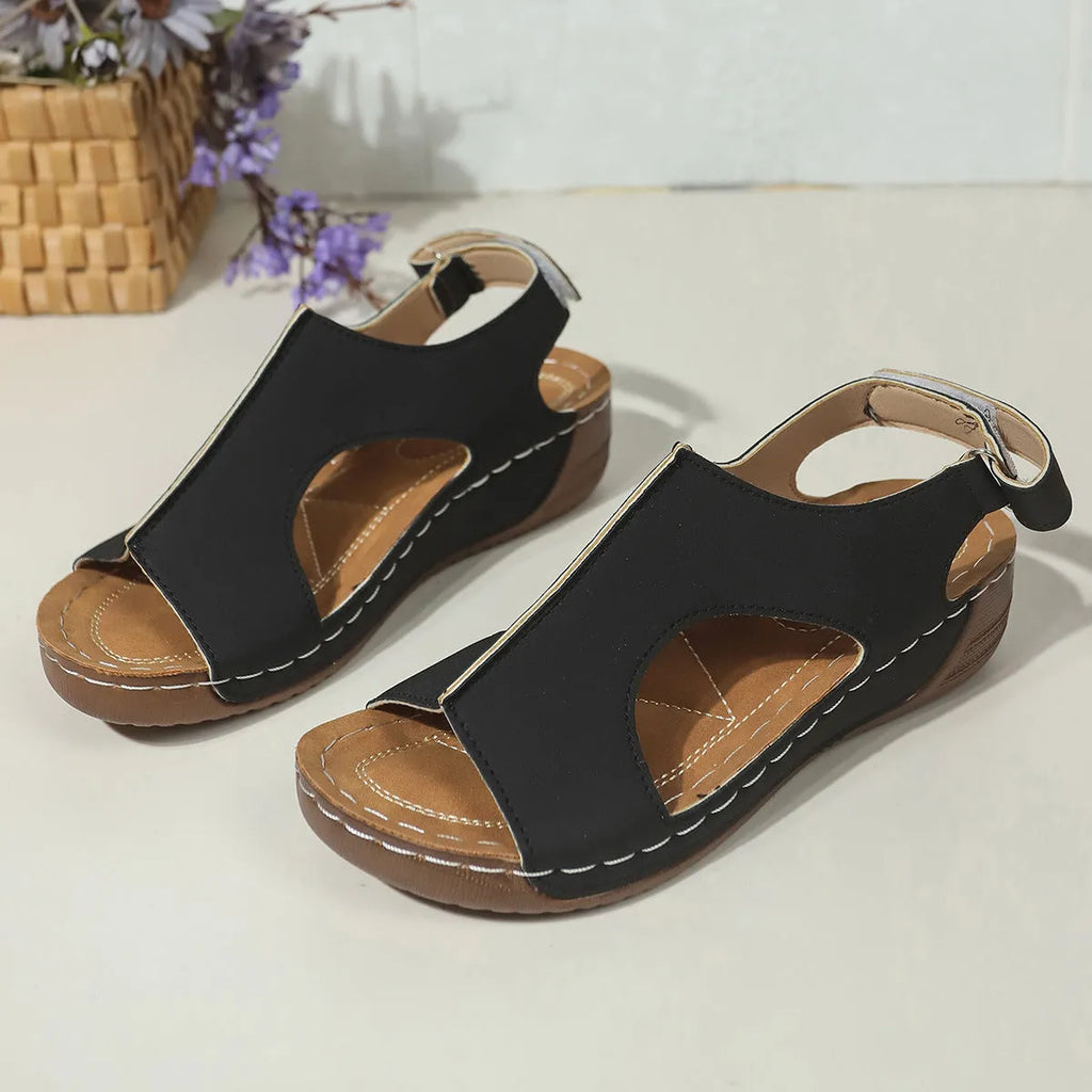 Women's plus size wedge sandals in light brown with Velcro strap, PU upper, and round toe on a neutral background