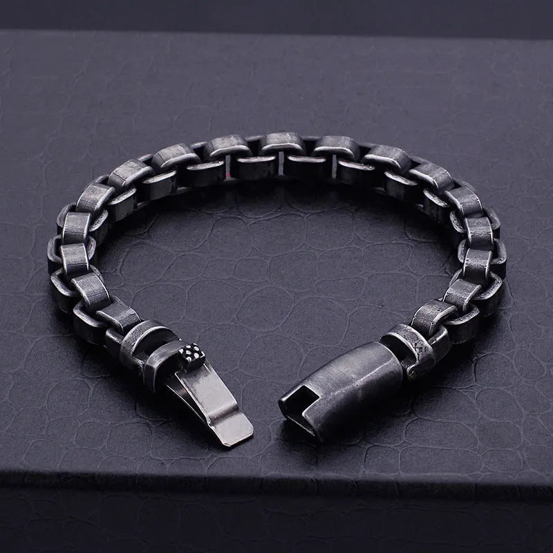 Black titanium steel punk chain bracelet with geometric design, 22cm length, on male wrist
