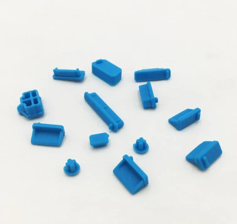 13-piece silicone dust plug set for laptop ports in multiple colours including transparent and black