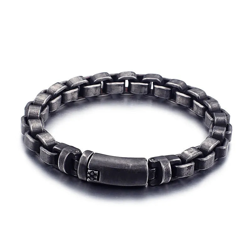 Black titanium steel punk chain bracelet with geometric design, 22cm length, on male wrist