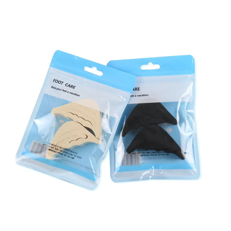 Beige EVA toe anti-slip pad with contoured shape for loose shoes, measuring 6.5 cm by 3 cm by 1.5 cm