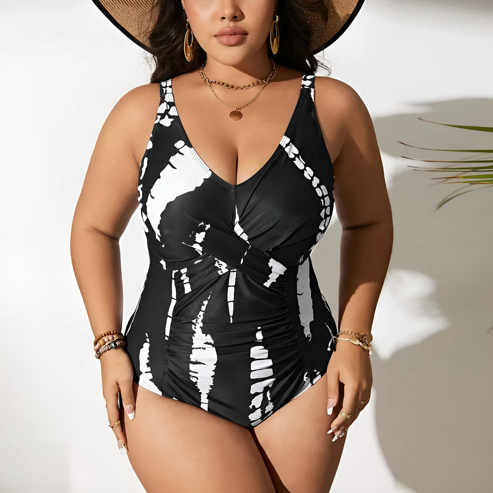 Black Siamese colour matching fit one-piece swimsuit for women on a size chart.