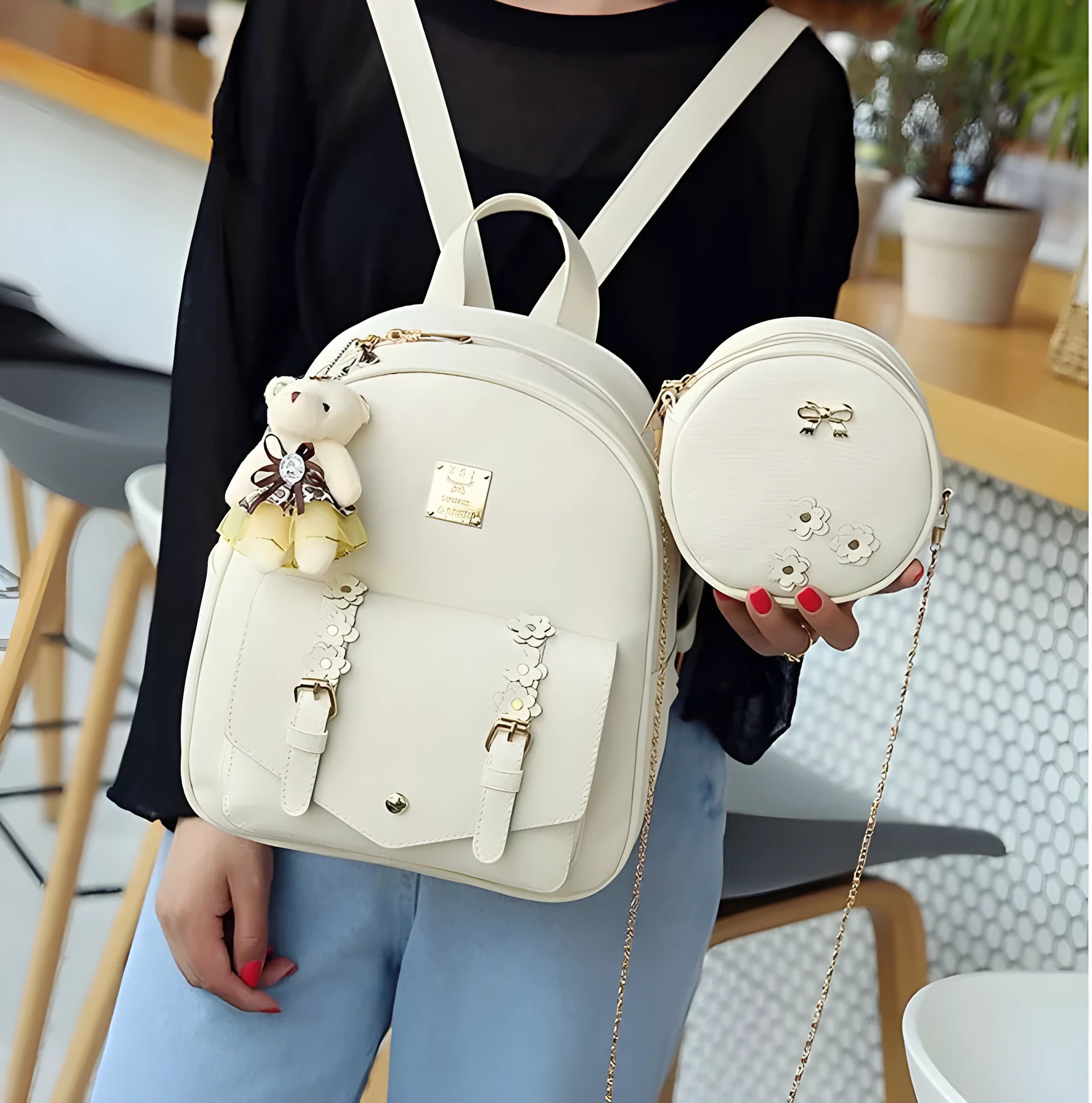Women's 3-piece floral PU leather bag set showing backpack, shoulder bag and card purse