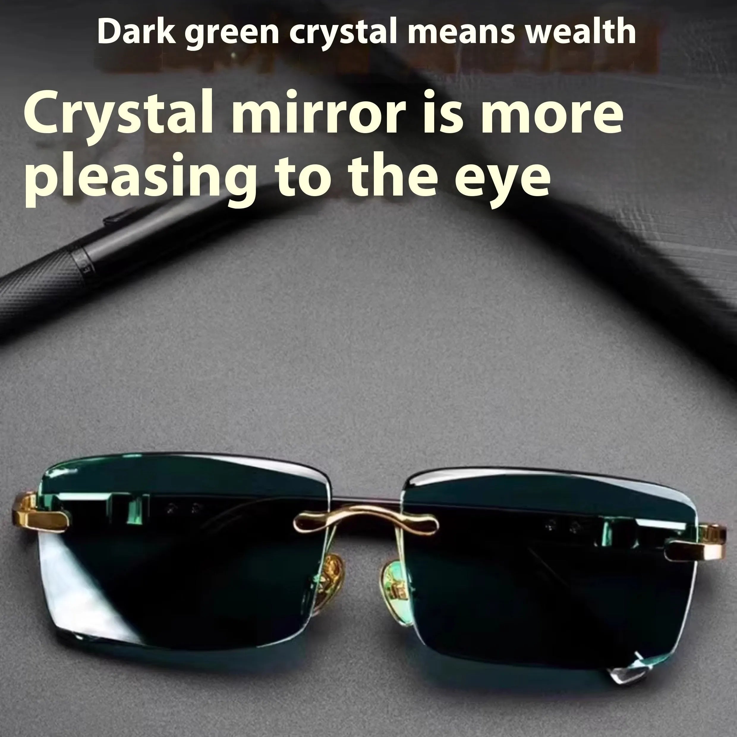 Frameless sunglasses with dark green tinted lenses and a black hard-shell case on a table.