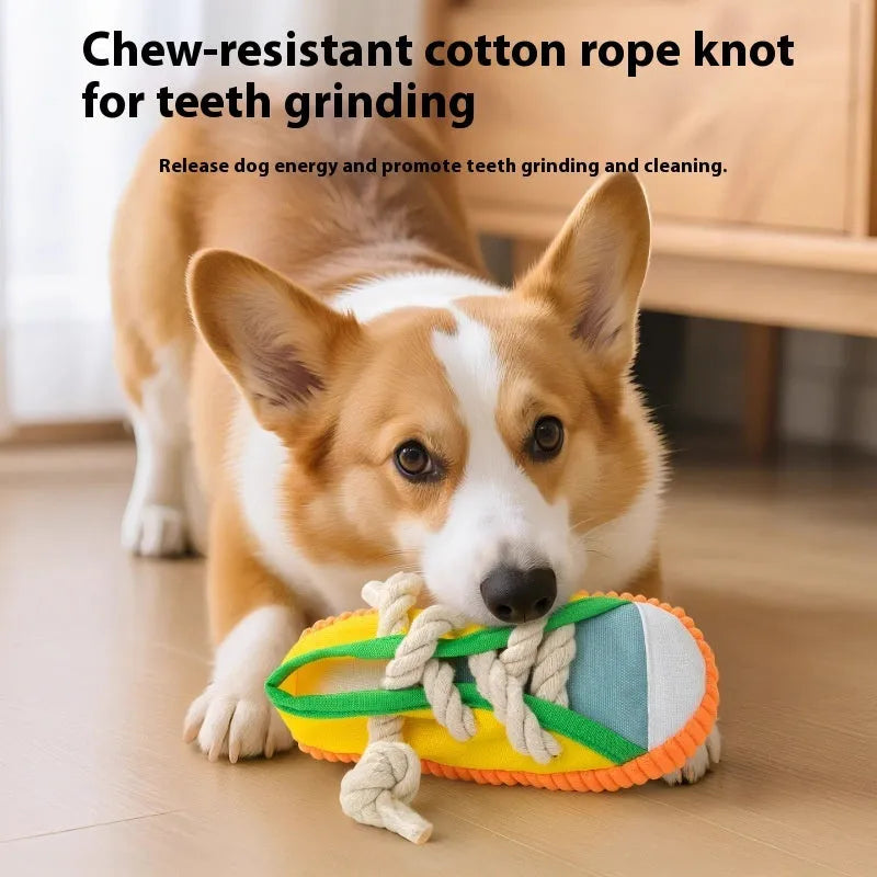 Yellow plastic dog chew toy shaped like slippers, with a sound mechanism for pet play.