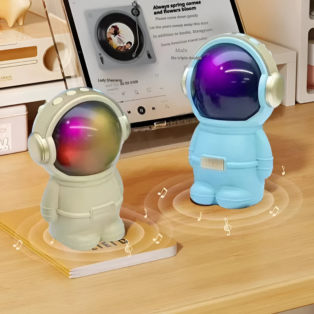 Spaceman mini stereo speaker in pink, USB powered with lighting, on a desktop