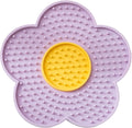 Flower-shaped silicone lick pad for pets with suction cups on smooth surface