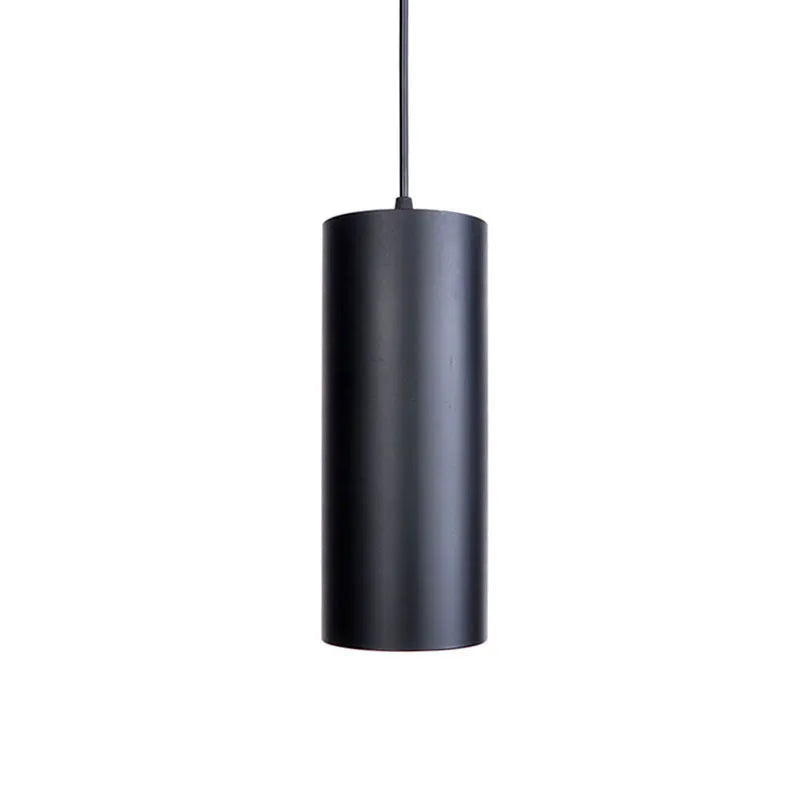 Retro black iron chandelier with multiple light arms hanging from a ceiling
