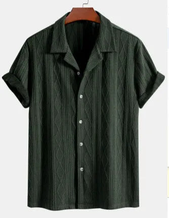 A man's loose-fit, short-sleeve cardigan in a solid colour, shown in black, green, or white.