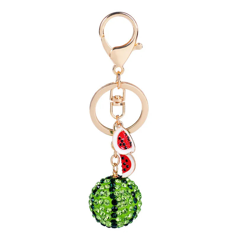 Green zinc alloy watermelon-shaped keychain charm on a metal ring.