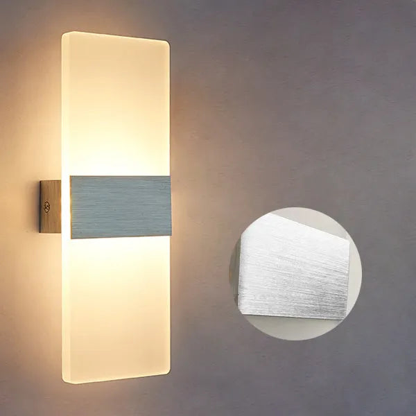 Modern acrylic LED wall lamp in black finish mounted on corridor wall