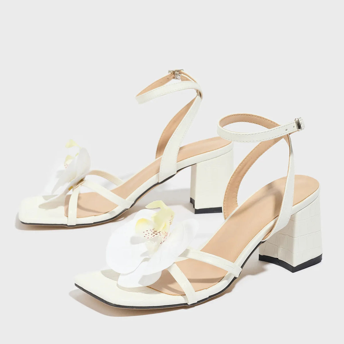 Women's white square toe chunky heel sandals with three-dimensional flower detail on artificial PU upper