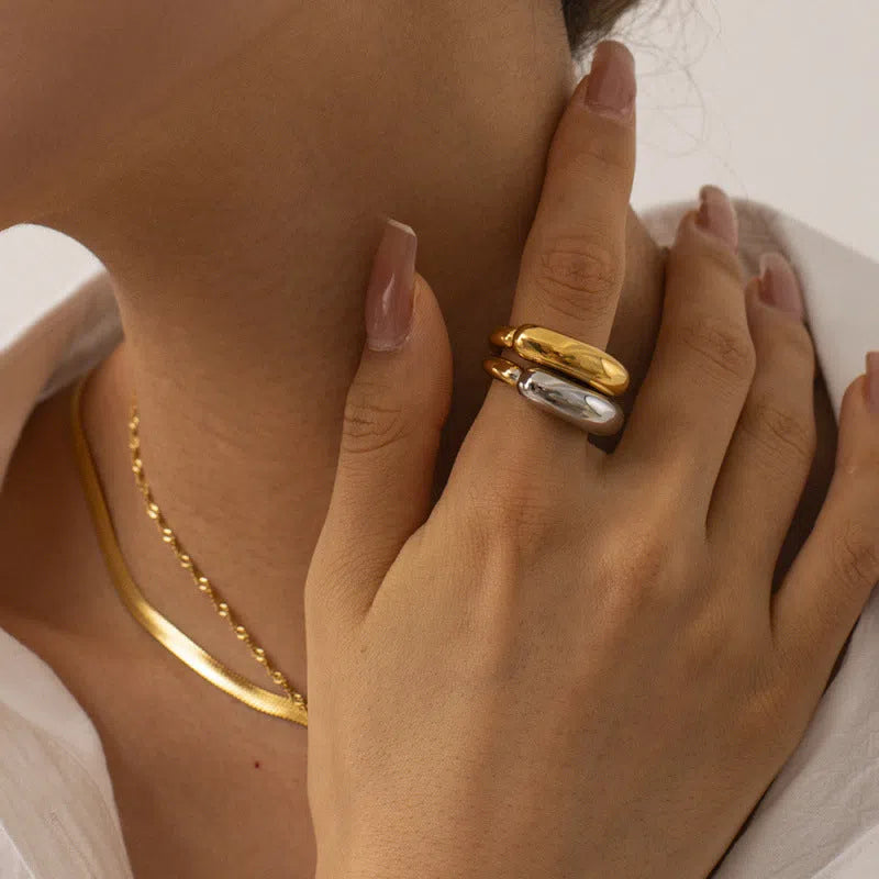 18K gold-plated double-arc geometric stainless steel ring for women on white background