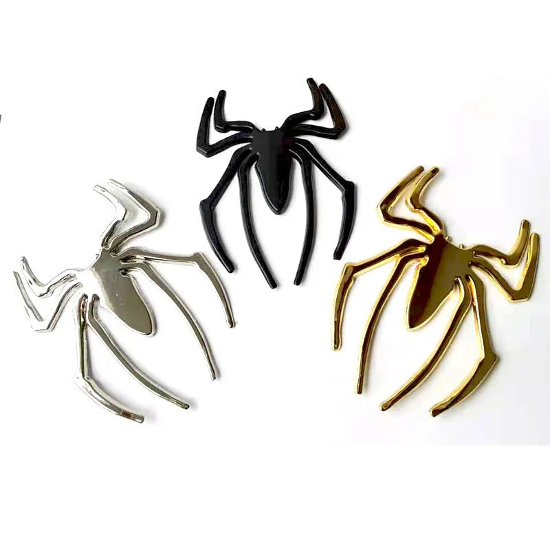 3D metal spider bumper sticker in gold on a car bumper