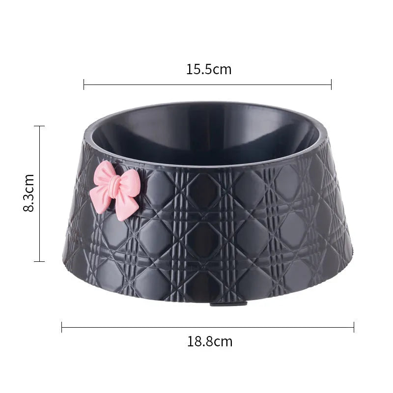 Ceramic pet bowl with diamond pattern and bowknot design in black, purple, and white options