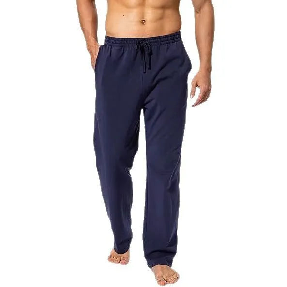 Men's loose fit quick-dry trousers in dark grey colour for sports and leisure activities