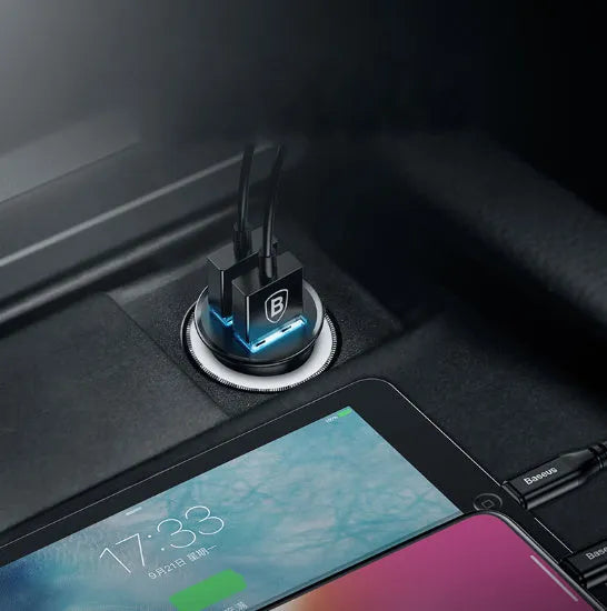 Black aluminium USB car charger with two ports showing 4.8A fast charging text