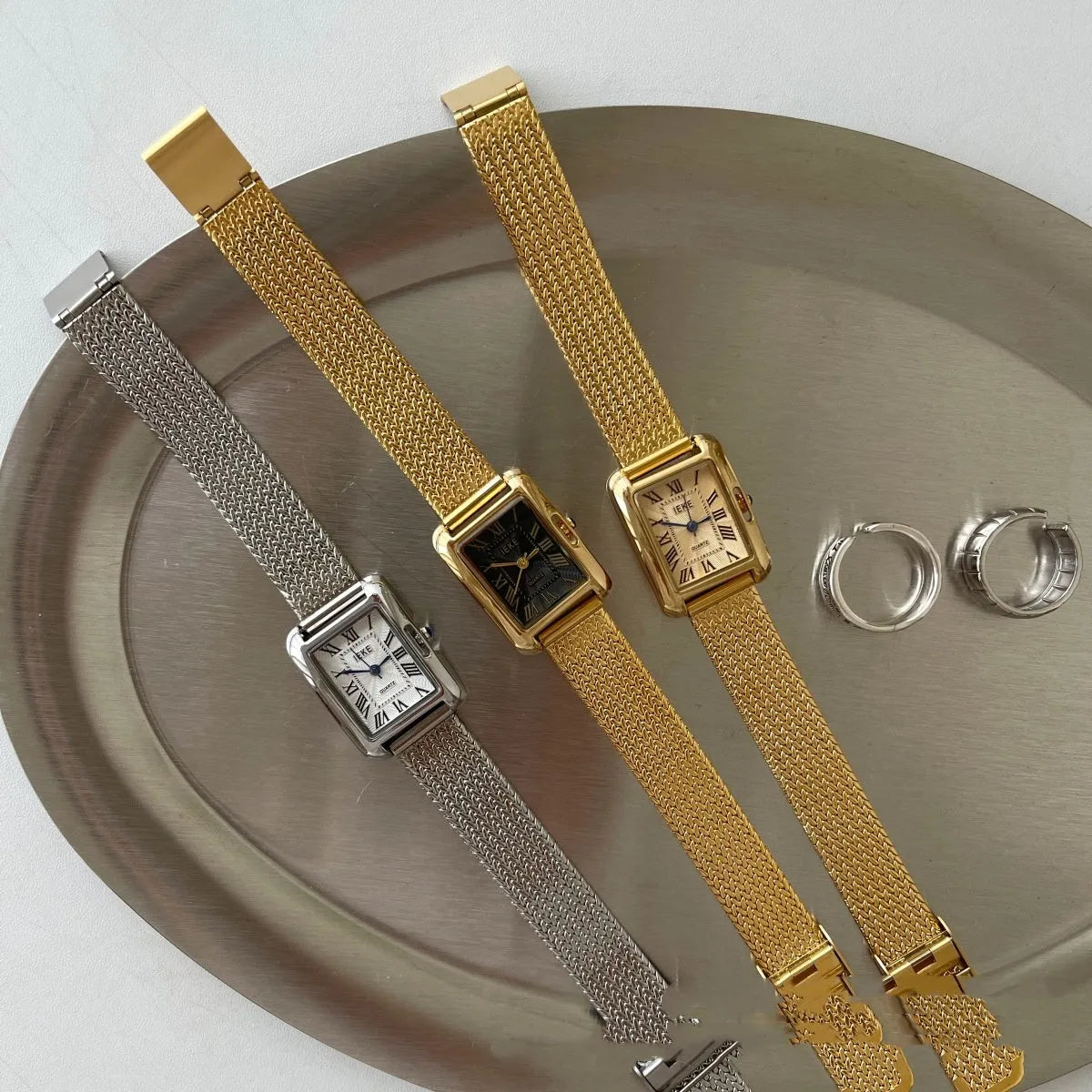 Lady's Roman retro square quartz watch with metal strap and glass face