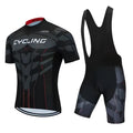 A man and woman wearing a matching blue cycling jersey set for summer road biking.