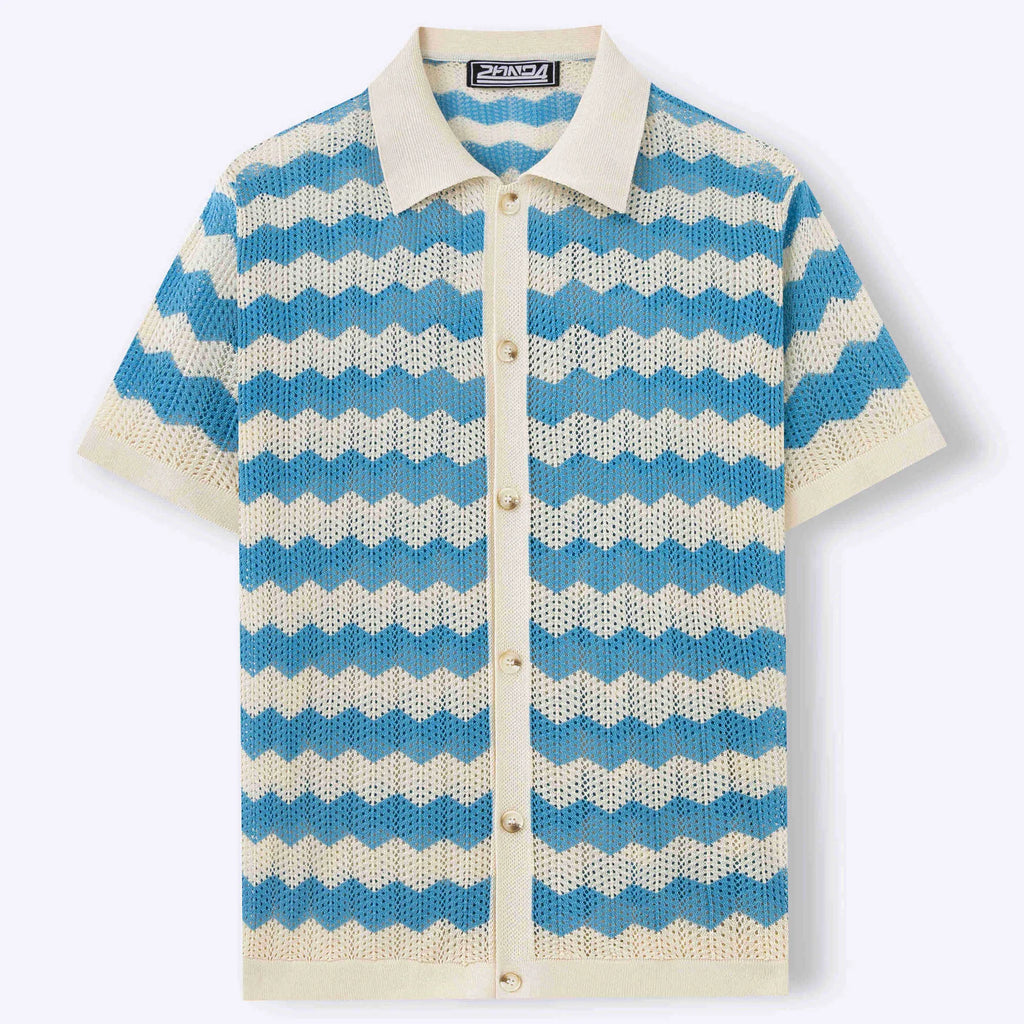 Man's short-sleeve blue sweater with a textured corduroy-like jacquard pattern, showing detail of the fabric weave.