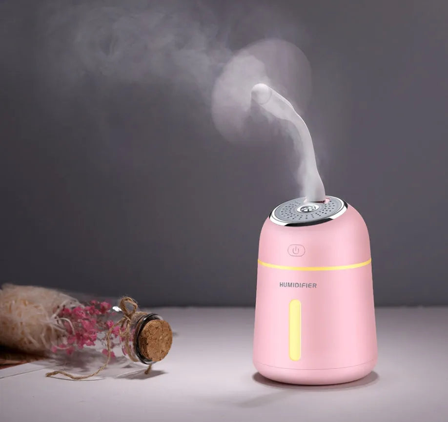 USB aromatherapy machine in white, pink, and blue with 330ml water tank and compact 96x96x139mm size