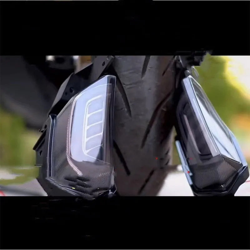 Pair of LED turn signal steering lights mounted on a Yamaha NMAX155 motorcycle handlebar, showing White/Yellow colour option.