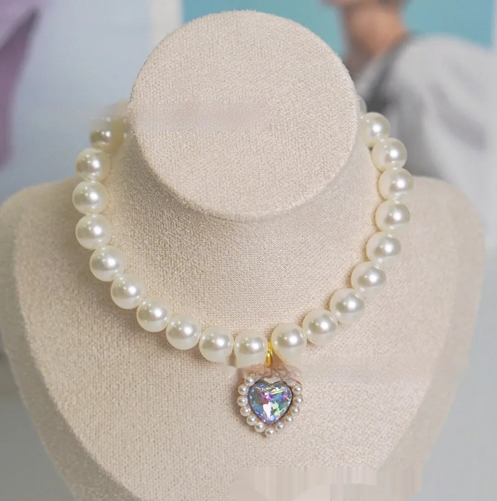 Decorative cat collar with plastic alloy resin construction and central gemstone charm in multiple colour options